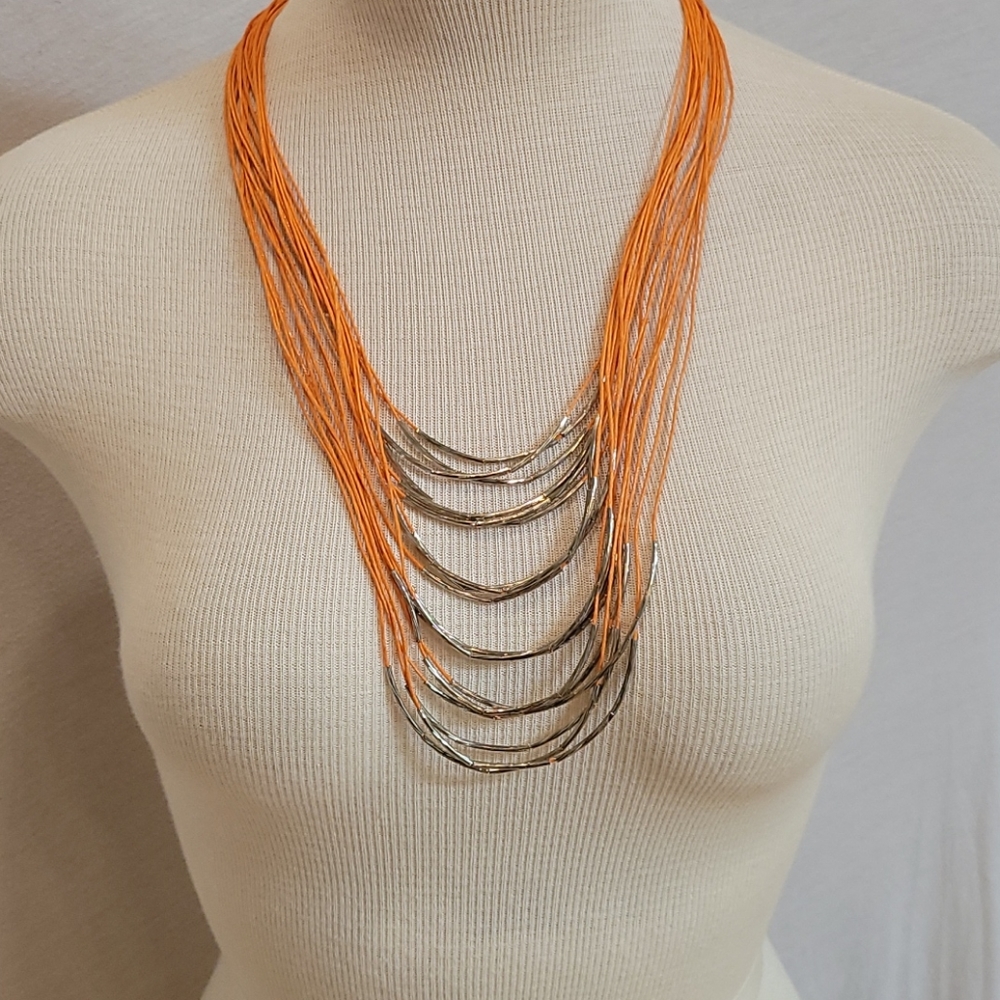 Handcrafted silver beads and orange thread necklac